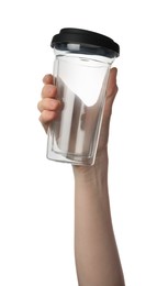 Photo of Woman holding glass cup on white background, closeup. Conscious consumption