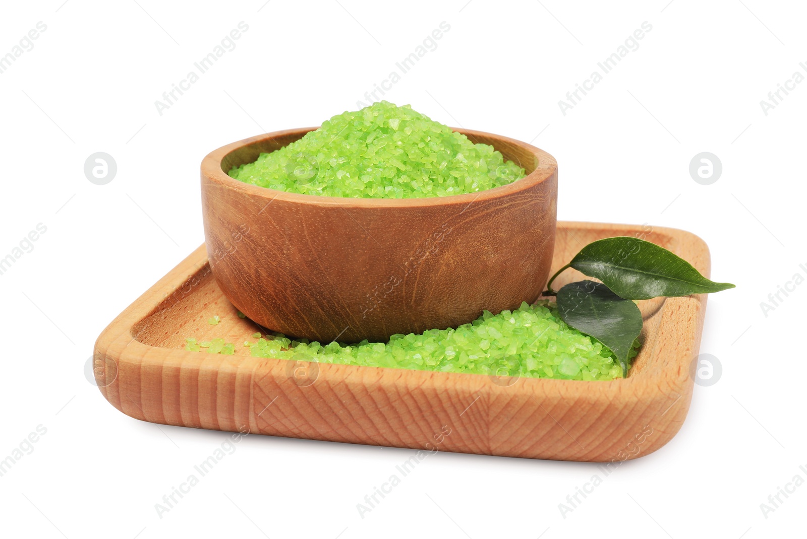 Photo of Green sea salt in bowl and leaves isolated on white