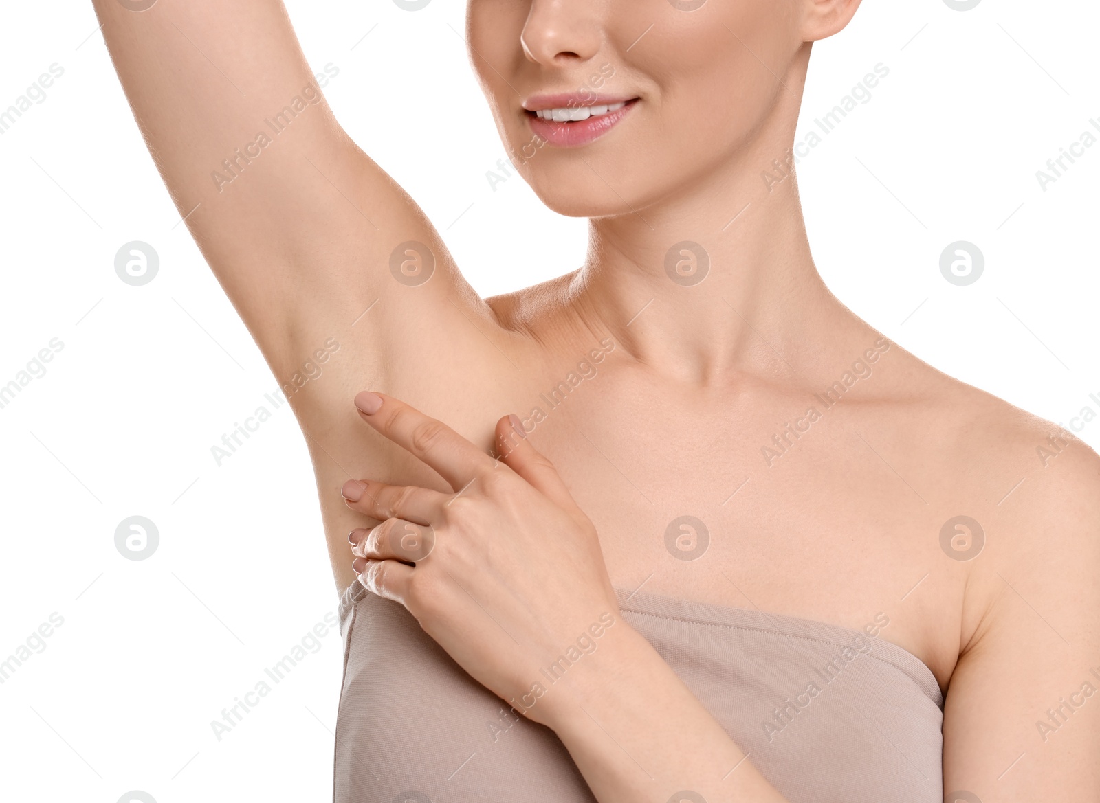 Photo of Woman showing armpit with smooth clean skin on white background, closeup