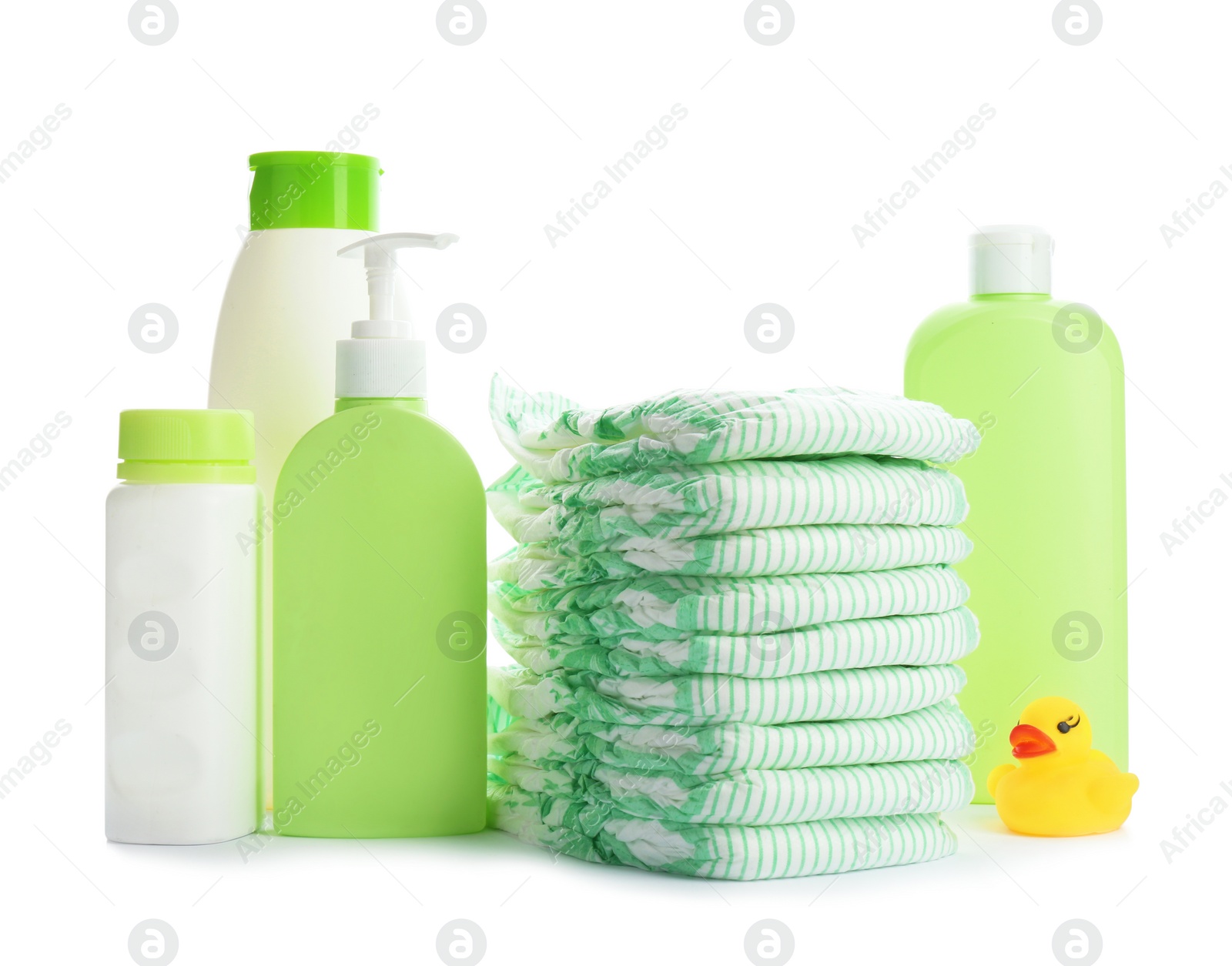 Photo of Composition with diapers and toiletries on white background. Baby accessories