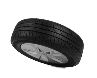 Car tire with rim on white background