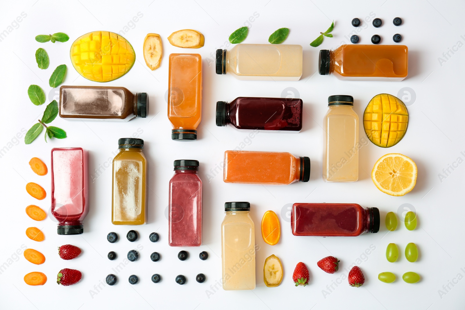 Photo of Flat lay composition with healthy detox smoothies and ingredients on light background