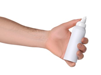 Photo of Man holding nasal spray on white background, closeup