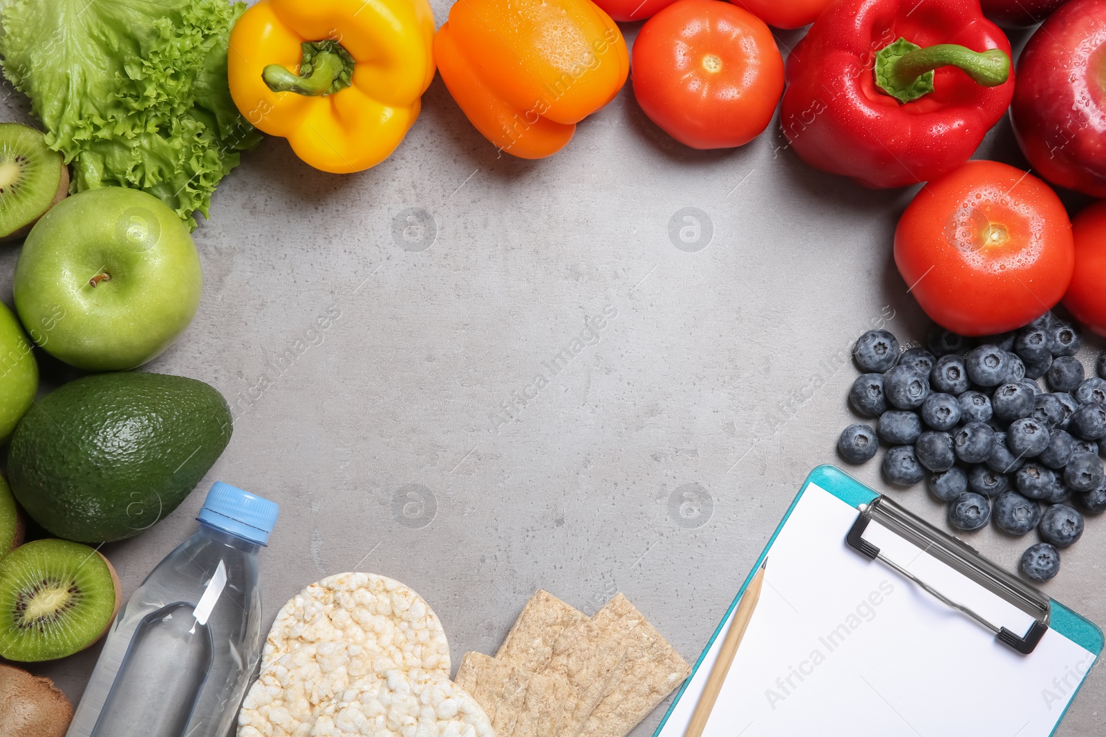 Photo of Flat lay composition with clipboard, healthy food and space for text on grey background. Weight loss concept