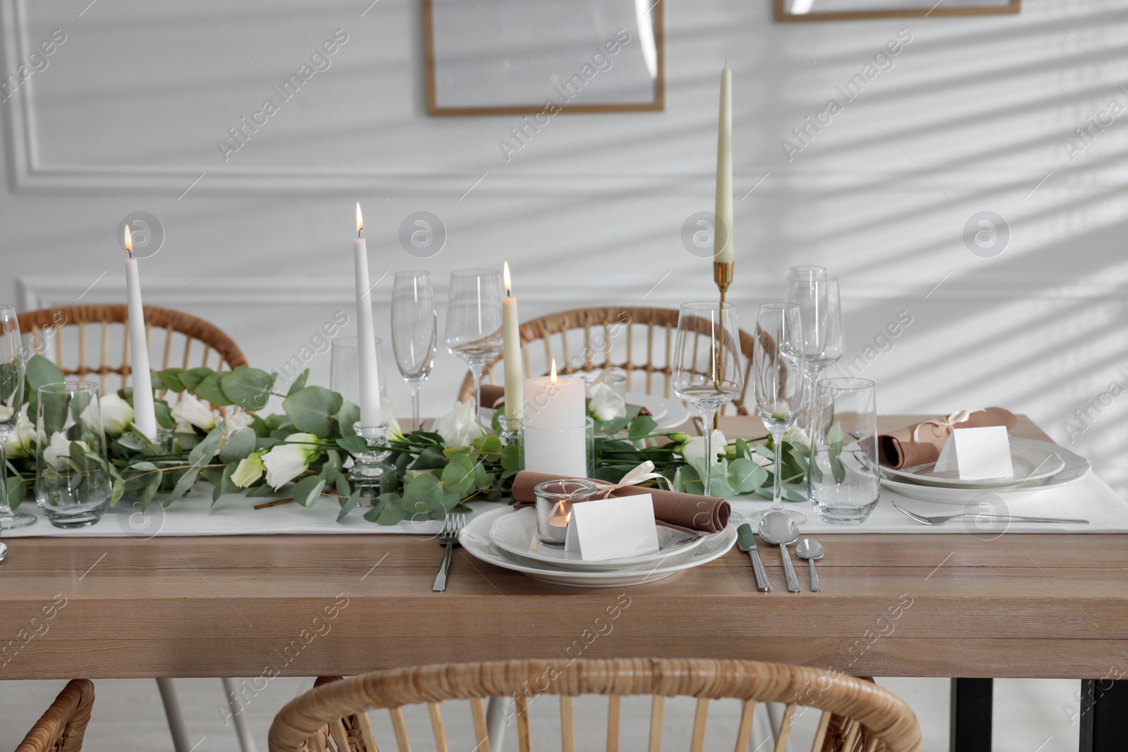 Photo of Festive table setting with beautiful tableware and decor indoors