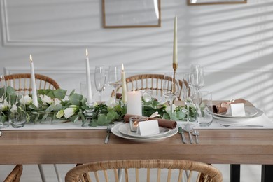 Festive table setting with beautiful tableware and decor indoors