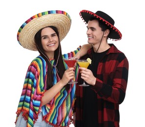 Photo of Lovely couple in Mexican sombrero hats with cocktails on white background