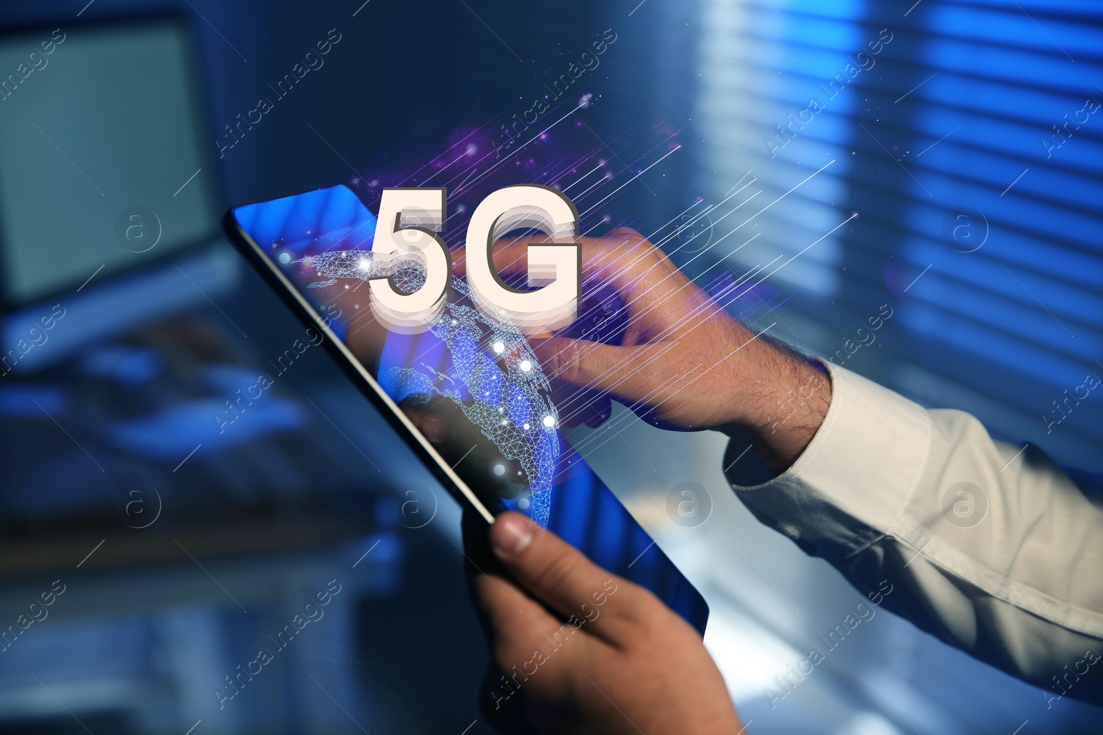 Image of Man using tablet with 5G network system indoors, closeup