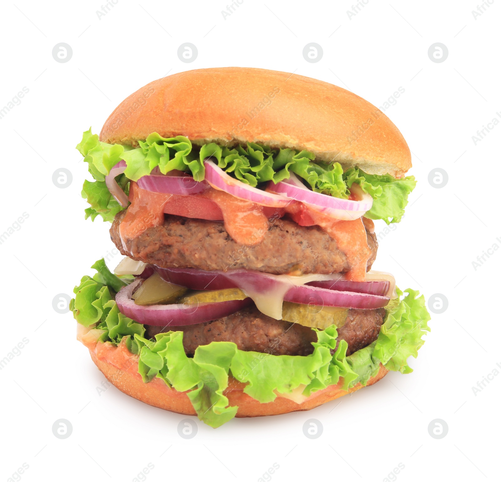 Photo of One tasty burger with vegetables, patties and lettuce isolated on white