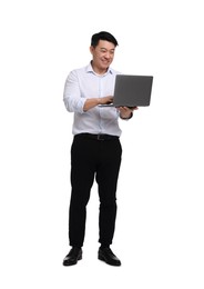 Businessman in formal clothes working on laptop against white background