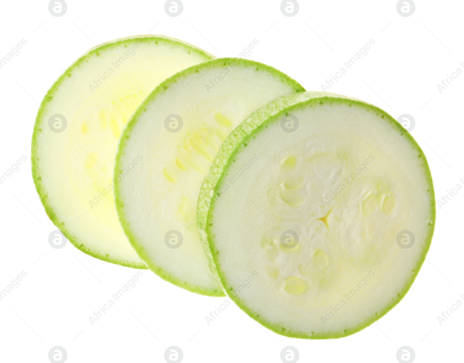 Photo of Slices of ripe zucchini on white background, top view