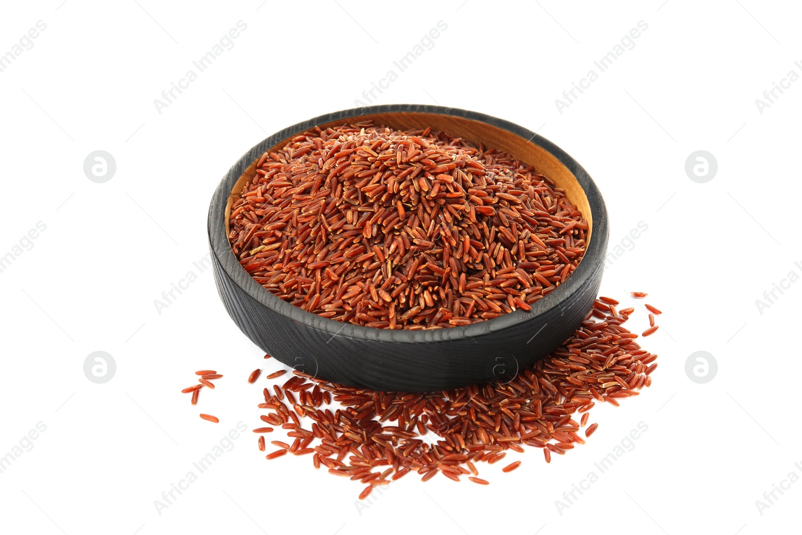 Photo of Plate with uncooked red rice on white background