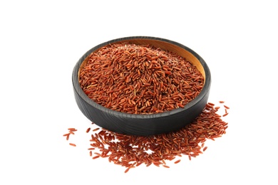 Photo of Plate with uncooked red rice on white background