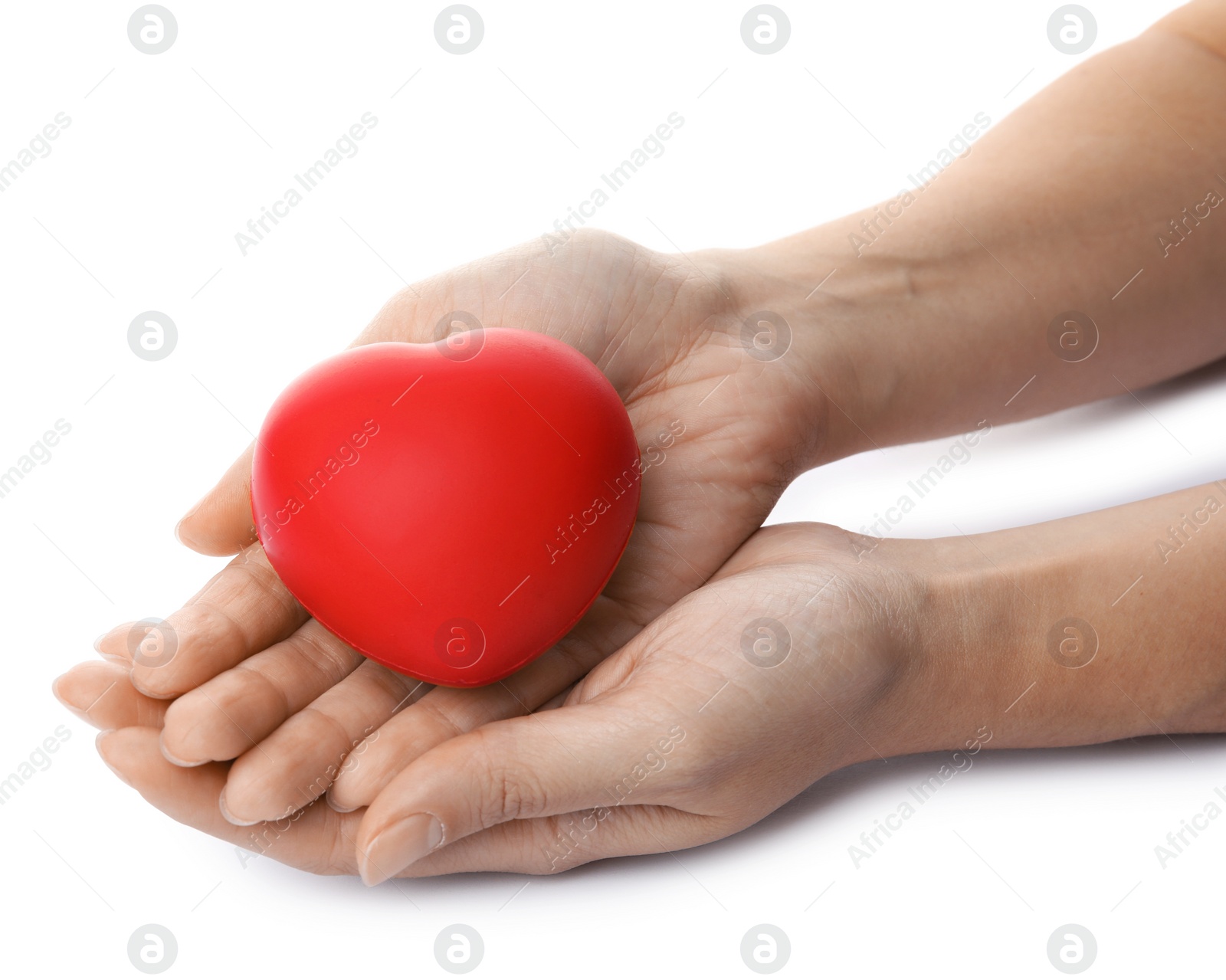 Photo of Woman holding red heart on white background, closeup. Cardiology concept