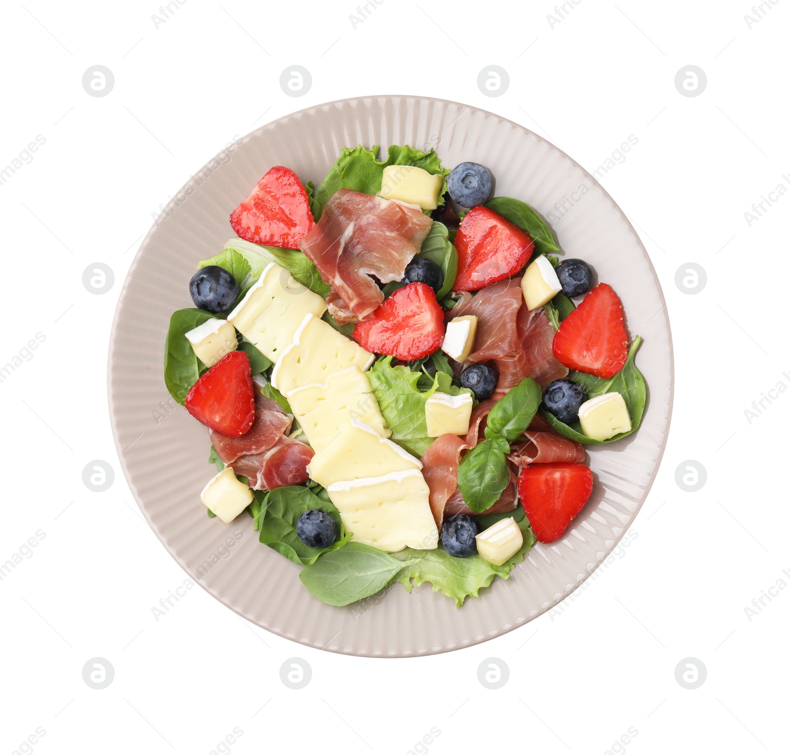 Photo of Tasty salad with brie cheese, prosciutto and berries isolated on white, top view