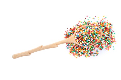 Photo of Colorful sprinkles in spoon on white background, top view. Confectionery decor