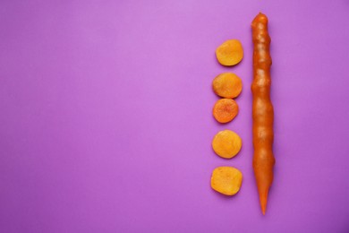 Delicious churchkhela and dried apricots on purple background, flat lay. Space for text