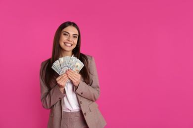 Photo of Businesswoman with money on color background. Space for text