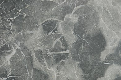 Texture of grey marble surface as background, closeup