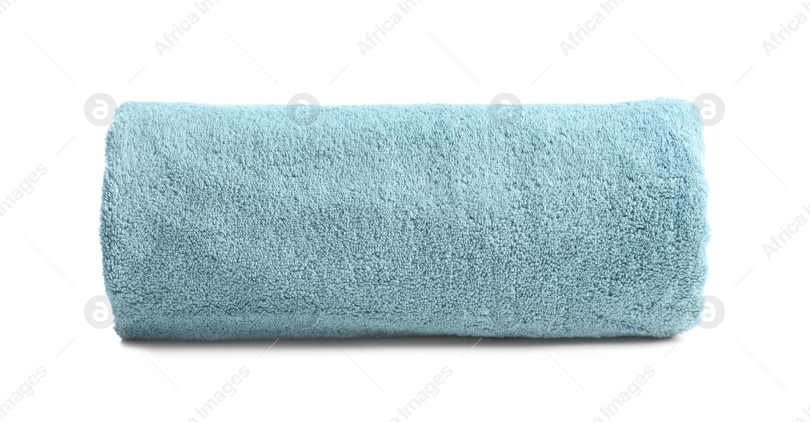 Photo of Rolled soft terry towel on white background