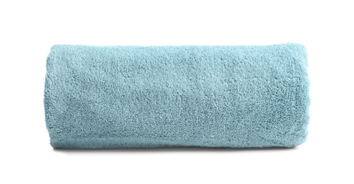 Photo of Rolled soft terry towel on white background