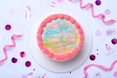 Cute bento cake with tasty cream and decor on white background, top view