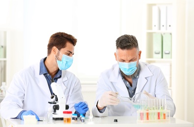 Scientists working in laboratory. Research and analysis