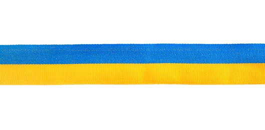 Photo of Ribbon with colors of national Ukrainian flag isolated on white, top view