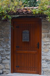 Entrance of building with beautiful old wooden door outdoors