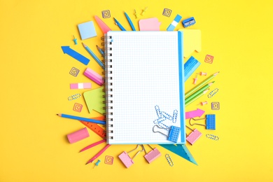 Photo of Flat lay composition with different school stationery on color background