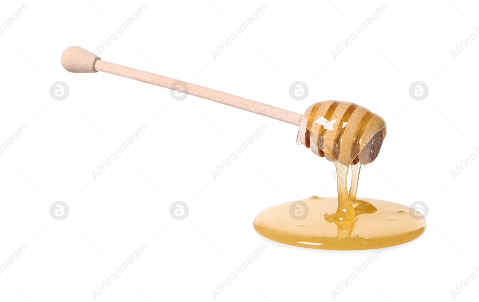 Photo of Natural honey dripping from dipper on white background