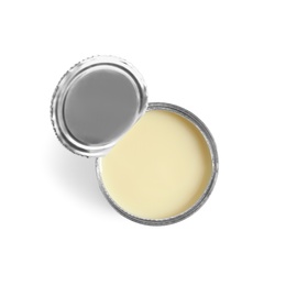 Photo of Tin can with condensed milk on white background, top view. Dairy product