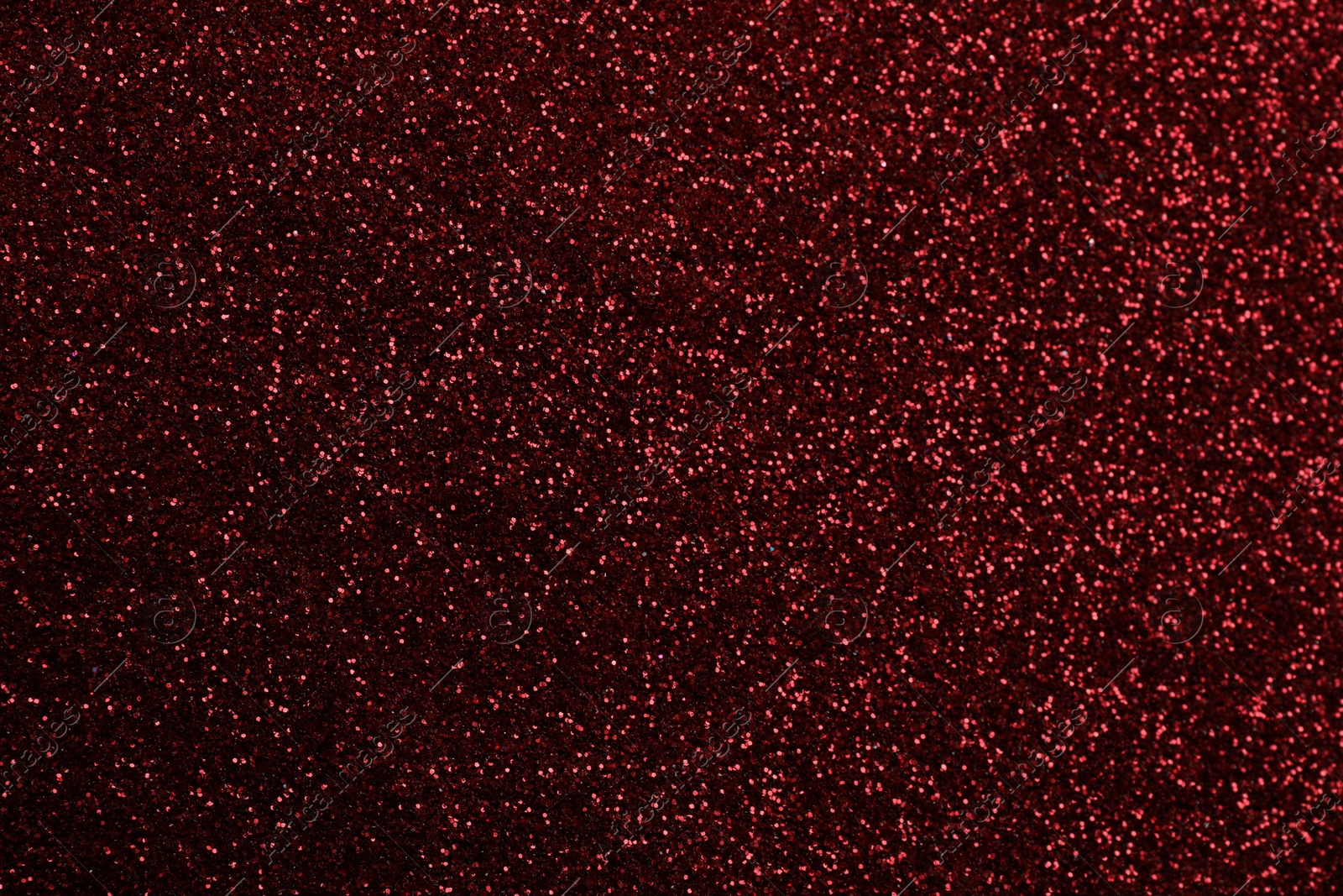 Photo of Beautiful shiny burgundy glitter as background, closeup