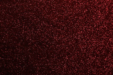 Beautiful shiny burgundy glitter as background, closeup