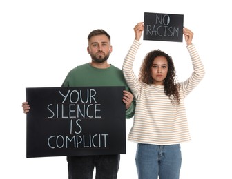 Photo of Young man and African American woman holding signs on white background. Racism concept