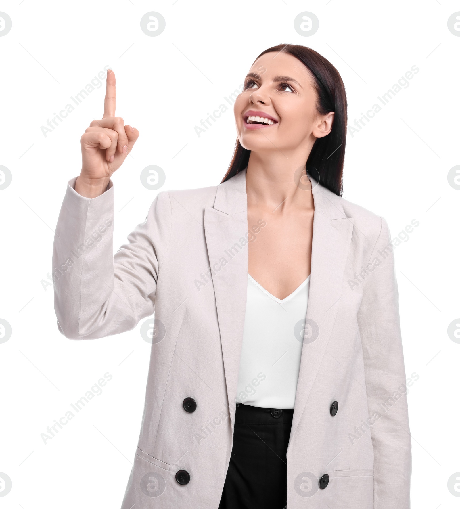 Photo of Beautiful businesswoman in suit pointing at something on white background