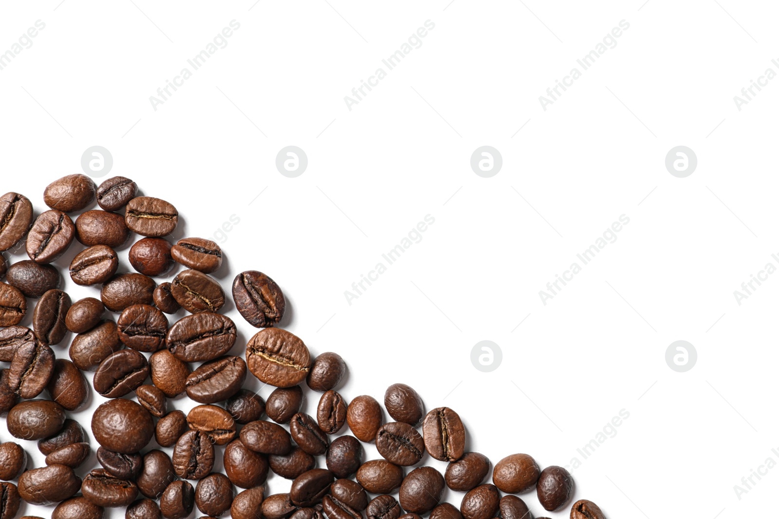 Photo of Roasted coffee beans on white background, top view