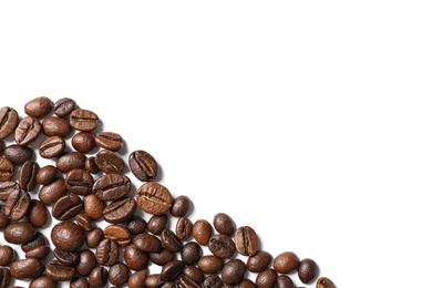 Photo of Roasted coffee beans on white background, top view