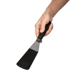 Photo of Woman holding spatula on white background. Kitchen utensils