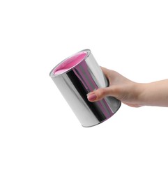 Woman holding can with pink paint on white background, closeup