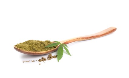 Wooden spoon with hemp protein powder and fresh leaf on white background