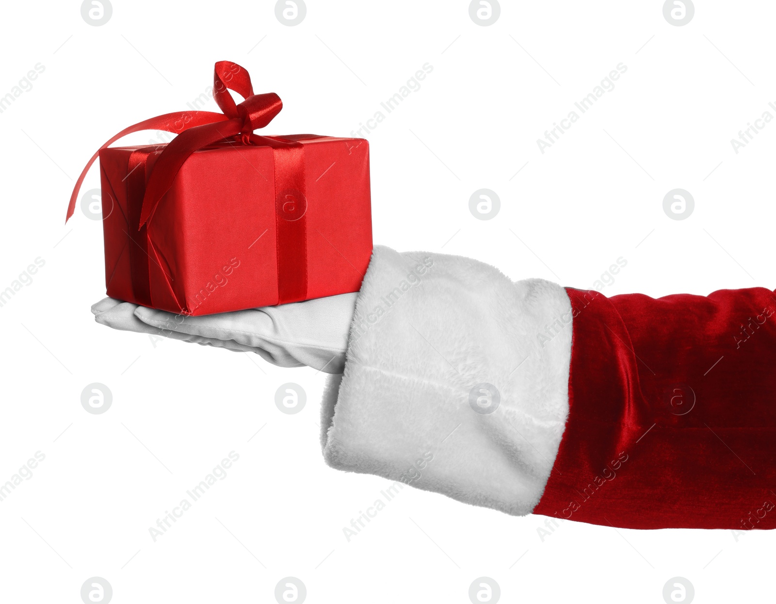 Photo of Merry Christmas. Santa Claus holding gift box on white background, closeup