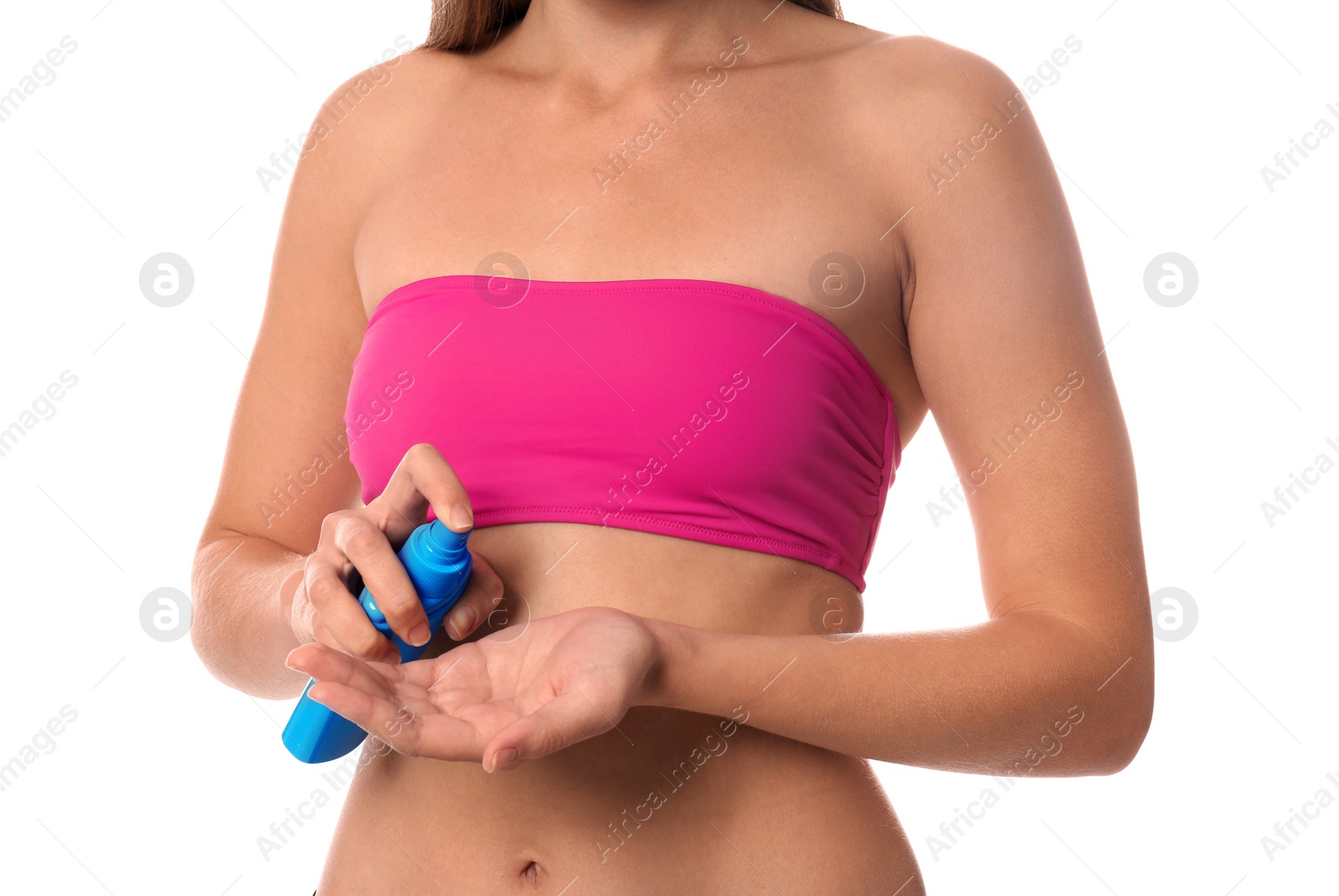 Photo of Woman applying sun protection cream on body against white background, closeup