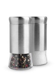 Salt shaker and pepper mill isolated on white