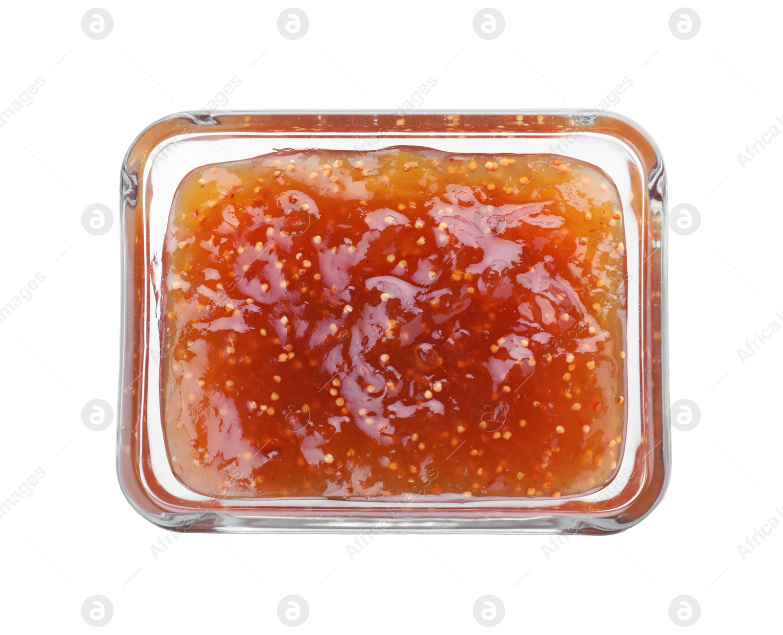 Photo of Delicious fig jam in glass bowl isolated on white, top view