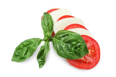 Photo of Tasty salad Caprese with mozzarella, tomatoes and basil isolated on white