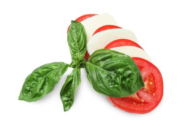 Tasty salad Caprese with mozzarella, tomatoes and basil isolated on white