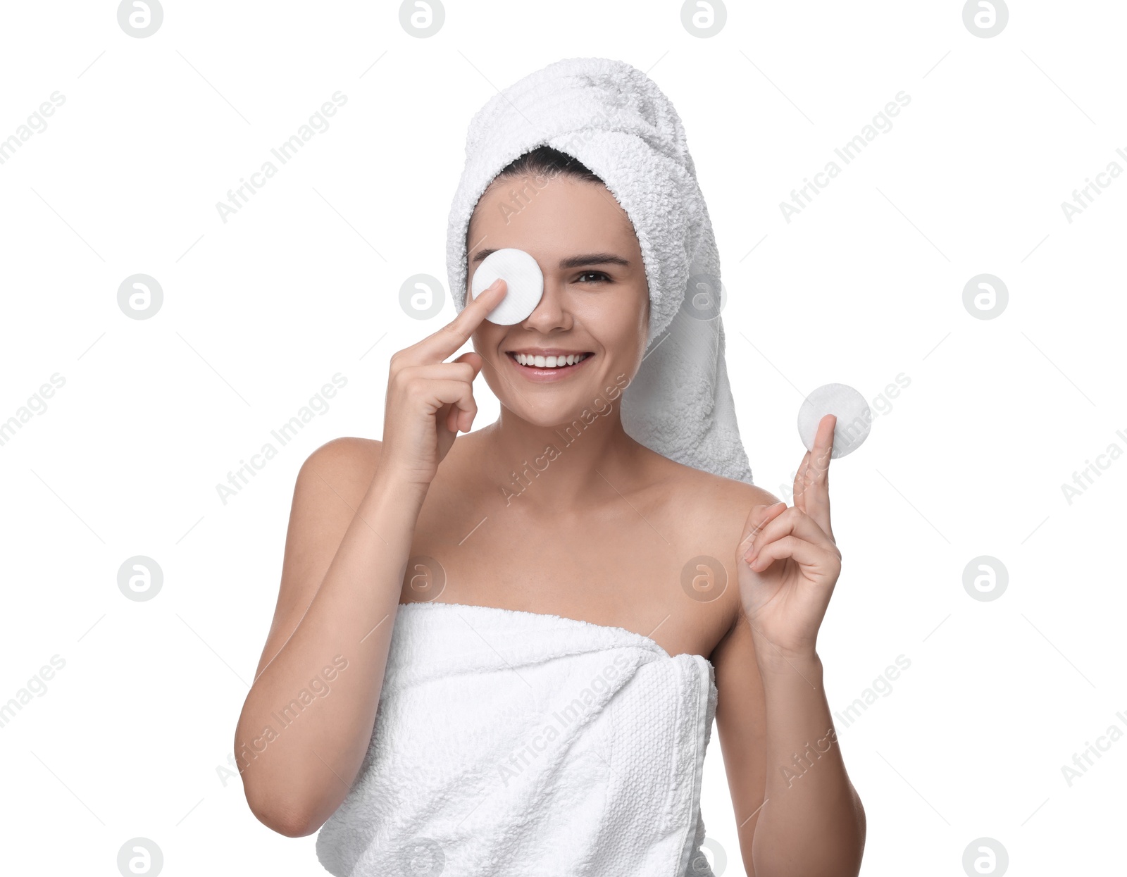 Photo of Young woman with cotton pads on white background