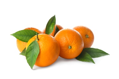 Photo of Fresh ripe oranges with green leaves on white background