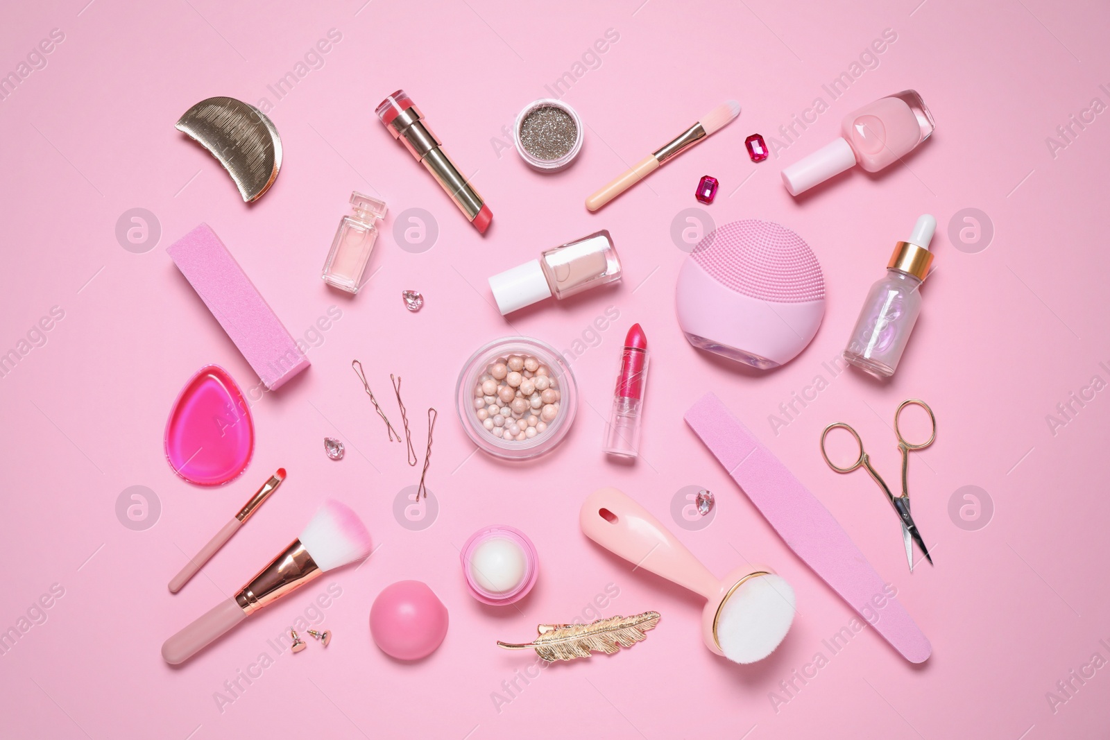 Photo of Flat lay composition with personal care products on pink background